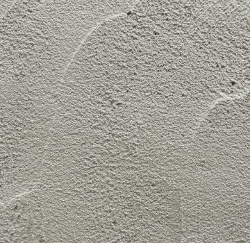 Rough cement plaster wall texture Background, Grey material concrete wall well space for text banner